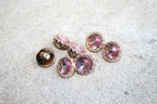 12 mm. øjeknap med rosa krystal