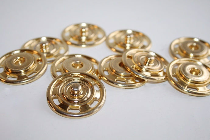 Tryklås guldfarvet 30 mm.