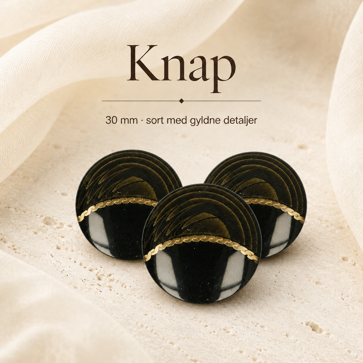 30 mm sort knap med gyldne detaljer
