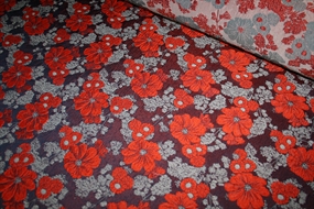 Jacquard med orange blomster