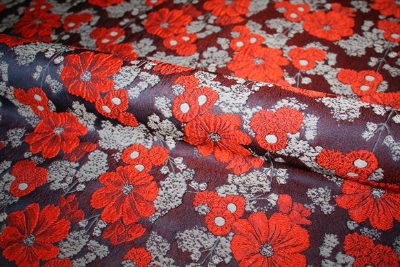 Jacquard med orange blomster